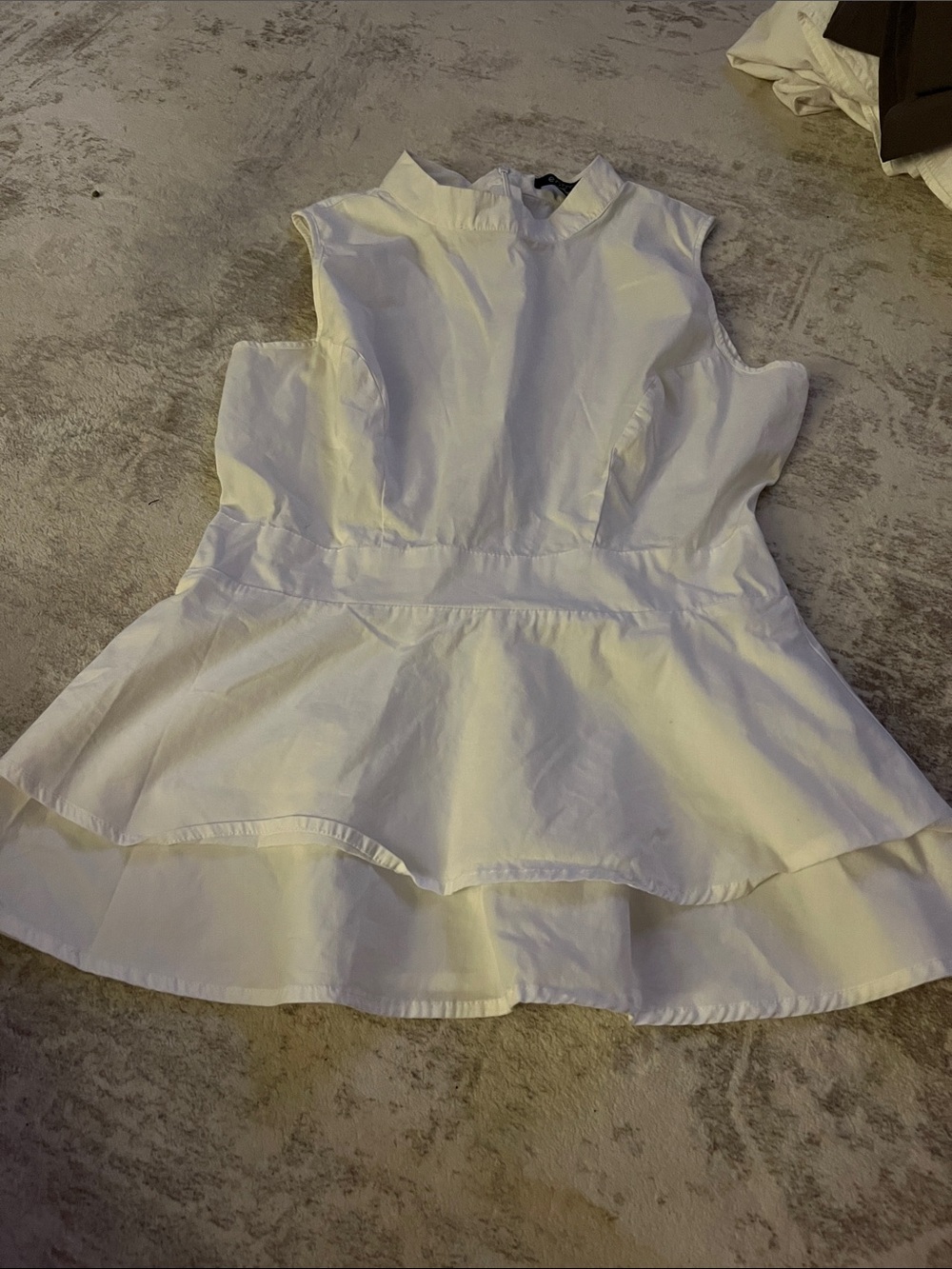 White Sleeveless Peplum Top